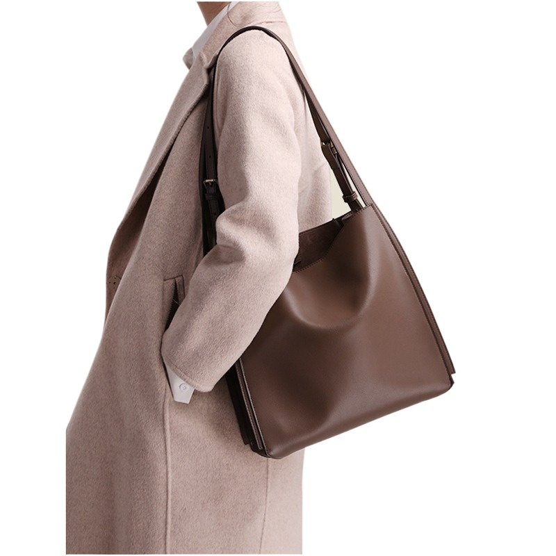 حقيبة جلدية أصلية للنساء للتنق - مراجعة Luxury Bags Quiet وسعره